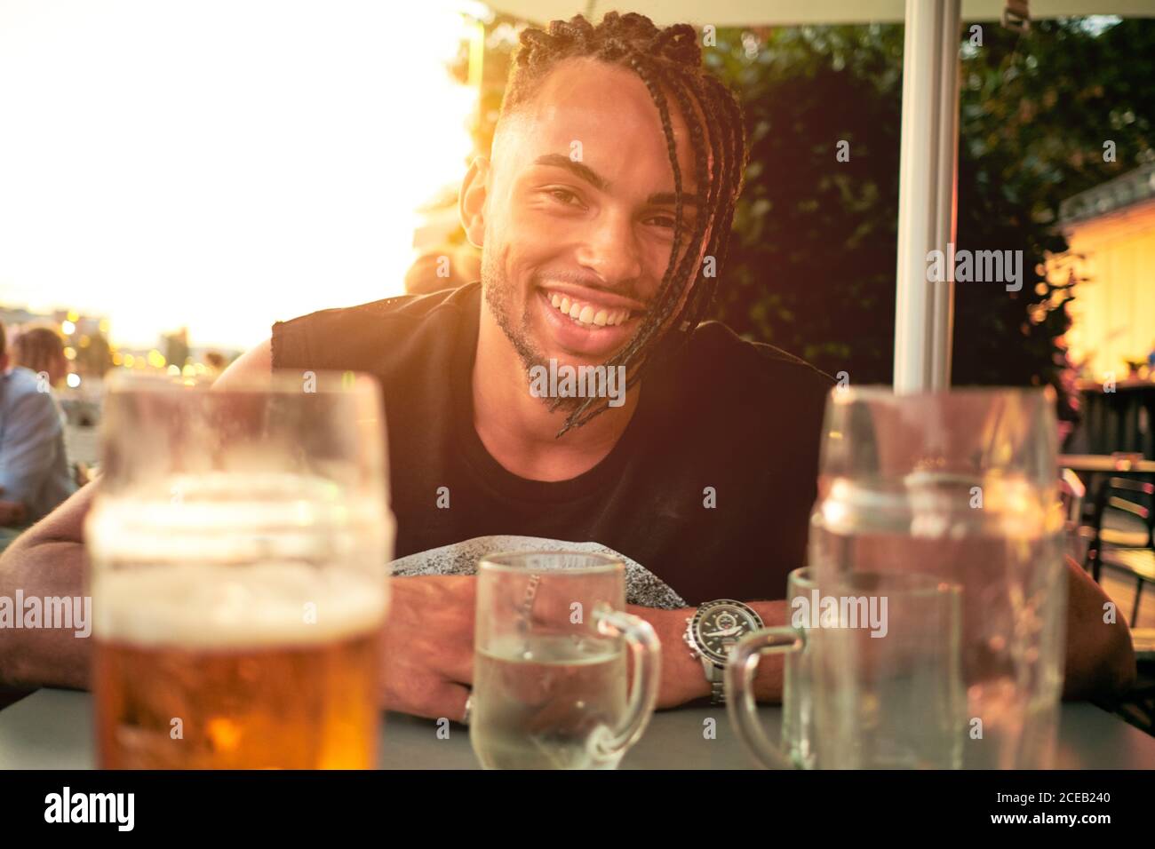 Young man sitting in bar Stock Photo