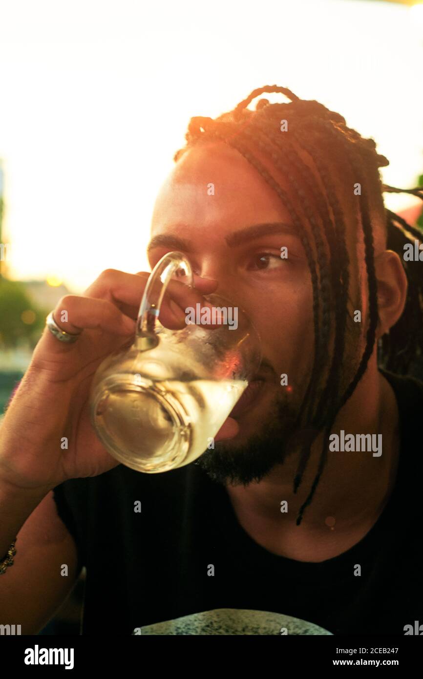 Young man sitting in bar Stock Photo