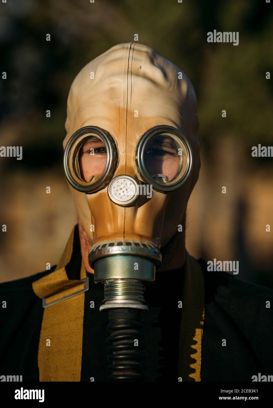 man with tear gas mask Stock Photo