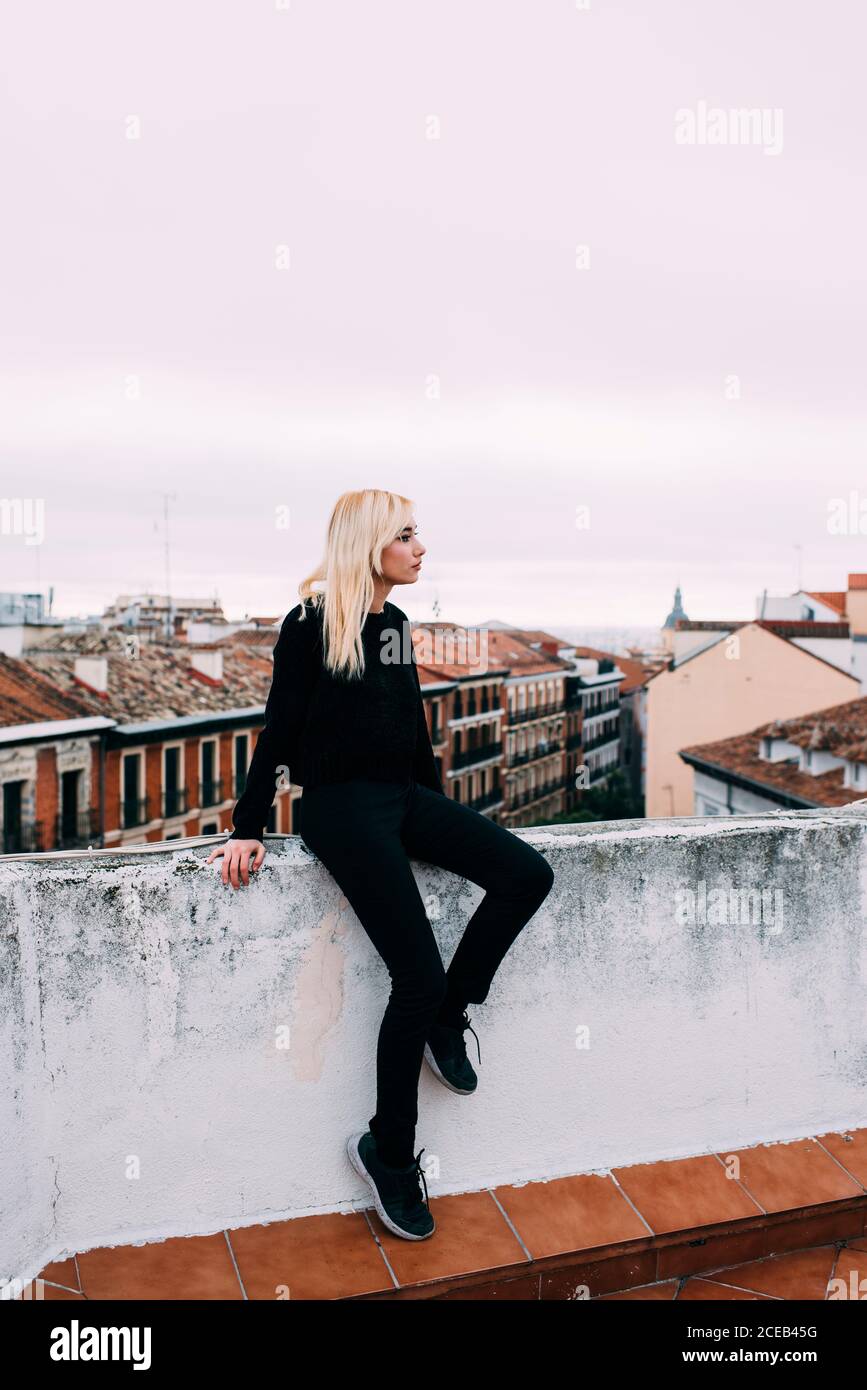 Blonde woman rear view outdoors hi-res stock photography and images - Alamy