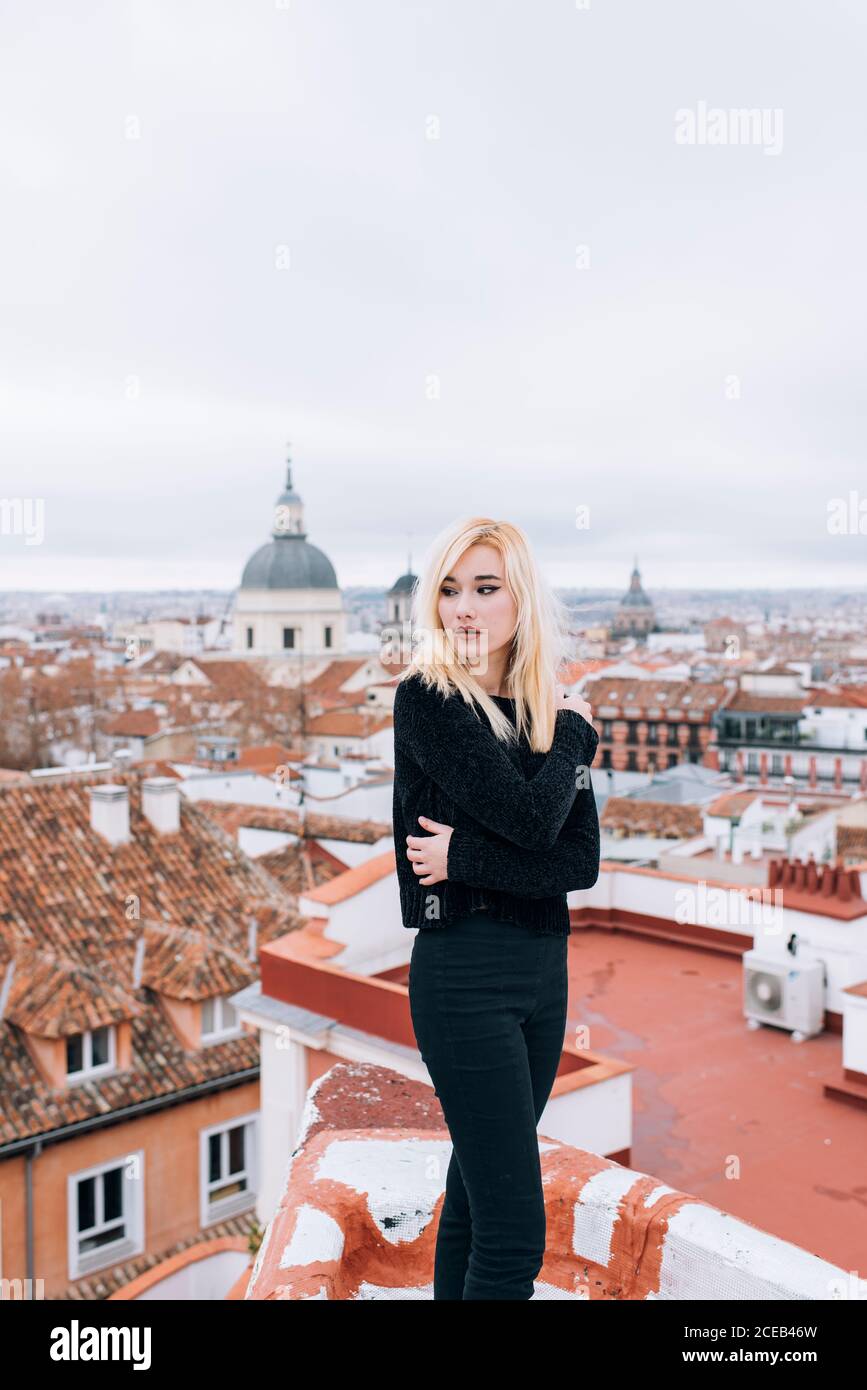 Blonde woman outside rear view hi-res stock photography and images - Alamy