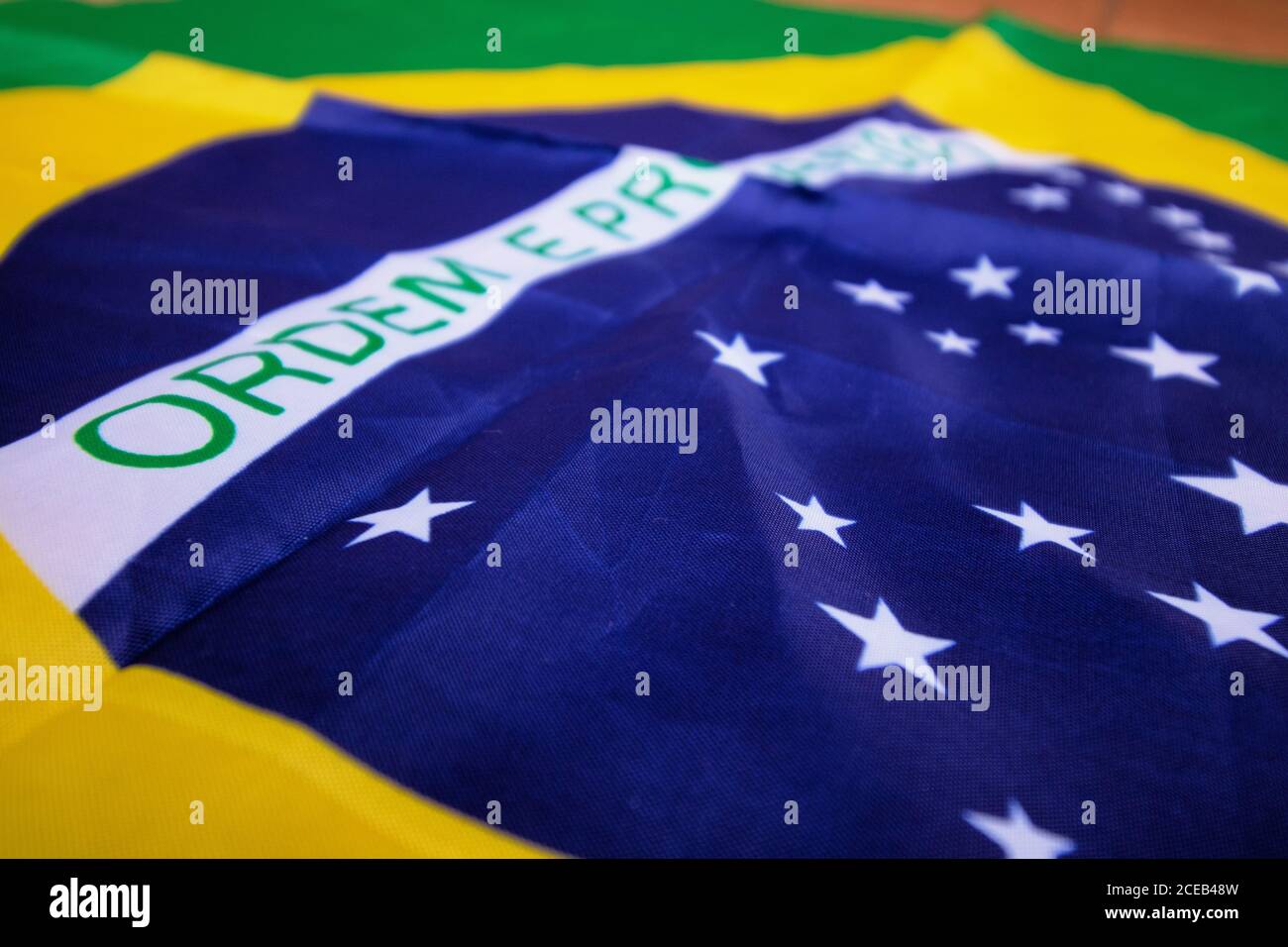 Brazilian flag kneaded - Dramatic concept image image. Stock Photo