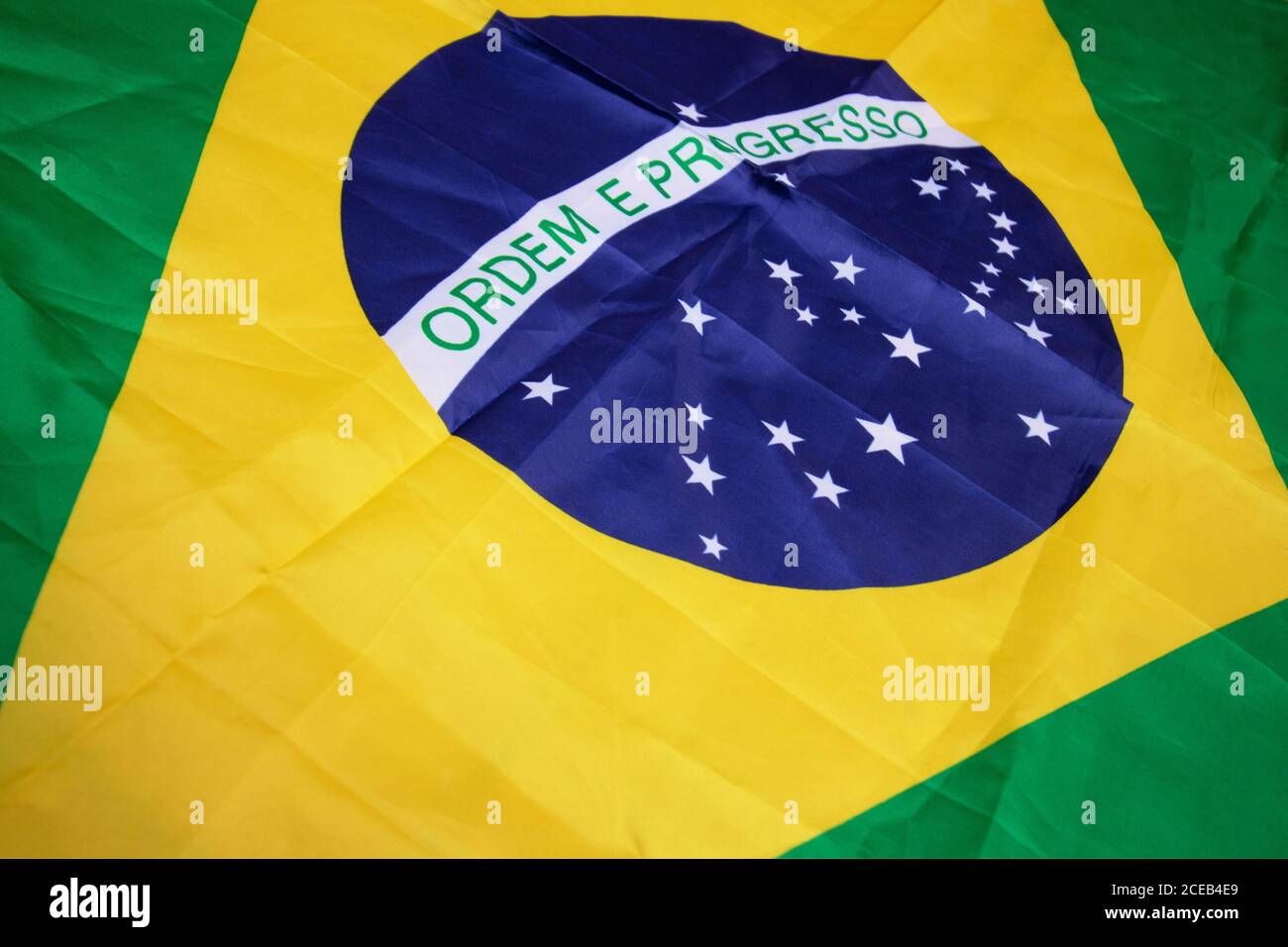 Brazilian flag kneaded - Dramatic concept image image. Stock Photo