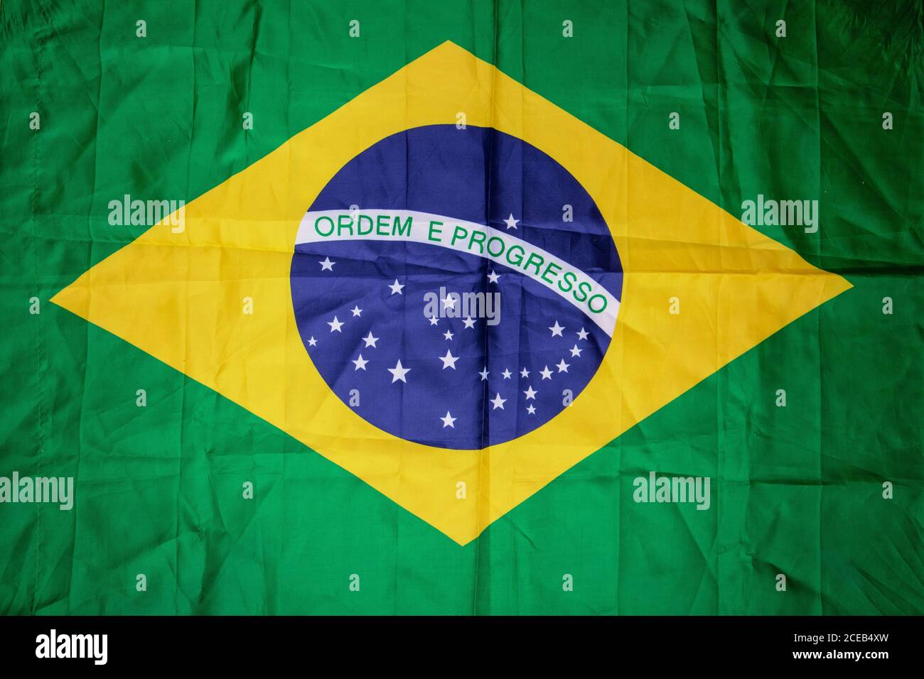Brazilian flag kneaded - Dramatic concept image image. Stock Photo