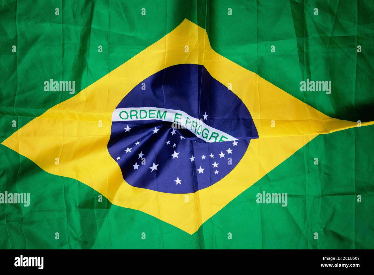 Brazilian flag kneaded - Dramatic concept image image. Stock Photo