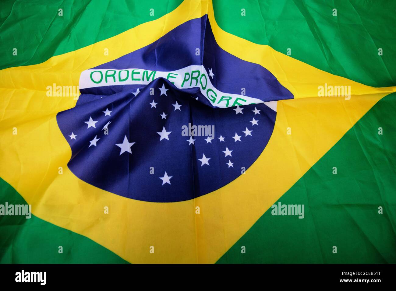 Brazilian flag kneaded - Dramatic concept image image. Stock Photo