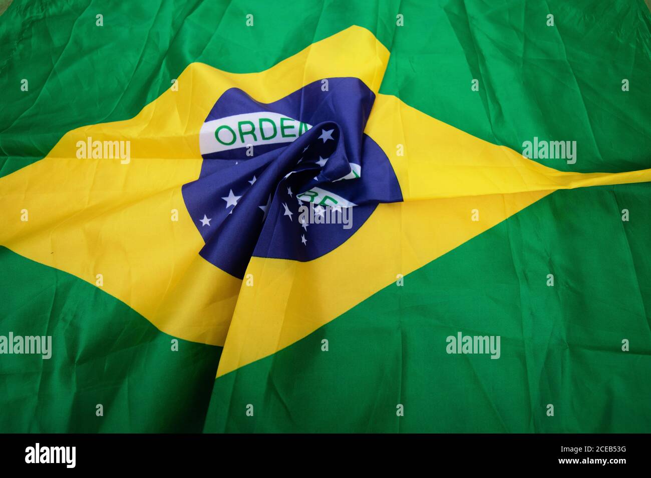 Brazilian flag kneaded - Dramatic concept image image. Stock Photo