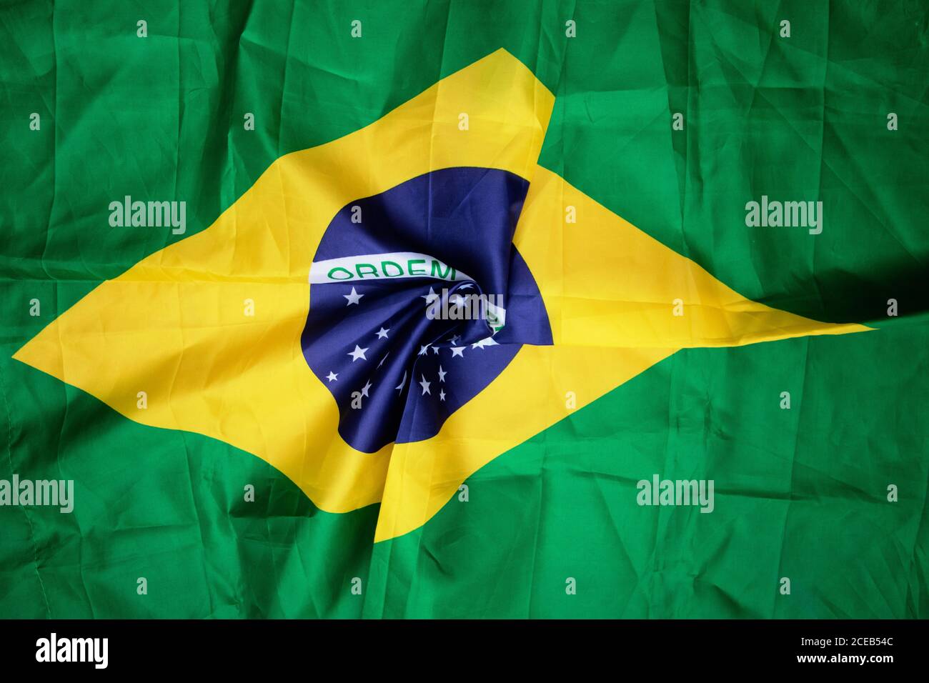 Brazilian flag kneaded - Dramatic concept image image. Stock Photo