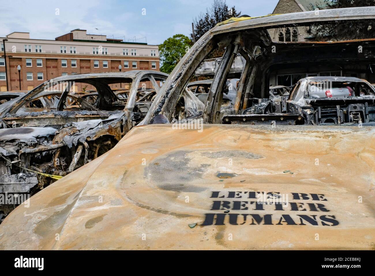 Kenosha, United States. 31st Aug, 2020. 'Let's Be Better Humans' is written on the vehicles on the lot of Car Source, a pre-owned vehicle dealership, are shown on Monday, August 31, 2020, after they were torched by protesters during demonstrations against the shooting in the back of a Jacob Blake, an unarmed Black man last week in Kenosha, Wisconsin. Photo by Alex Wroblewski/UPI Credit: UPI/Alamy Live News Stock Photo