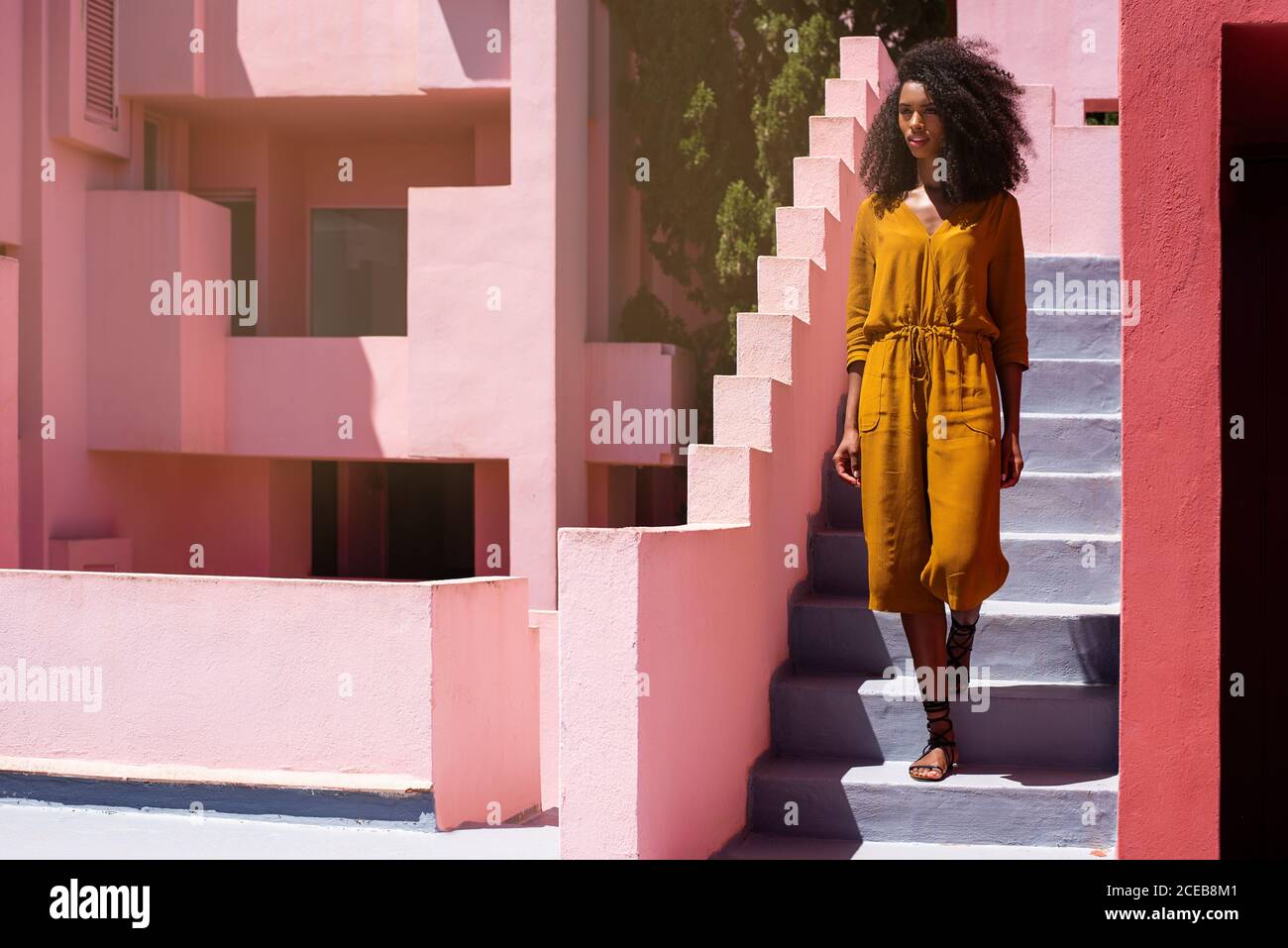 Woman walking stairs building hi-res stock photography and images - Alamy