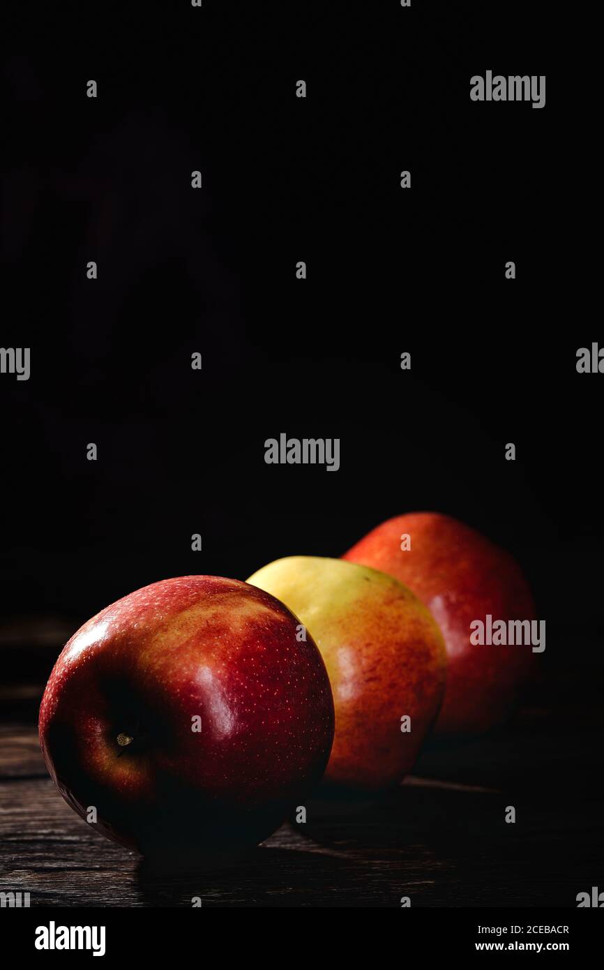 Red Apple Rawa Raw Red apple on dark table. Healthy food. Detox Stock Photo - Alamy