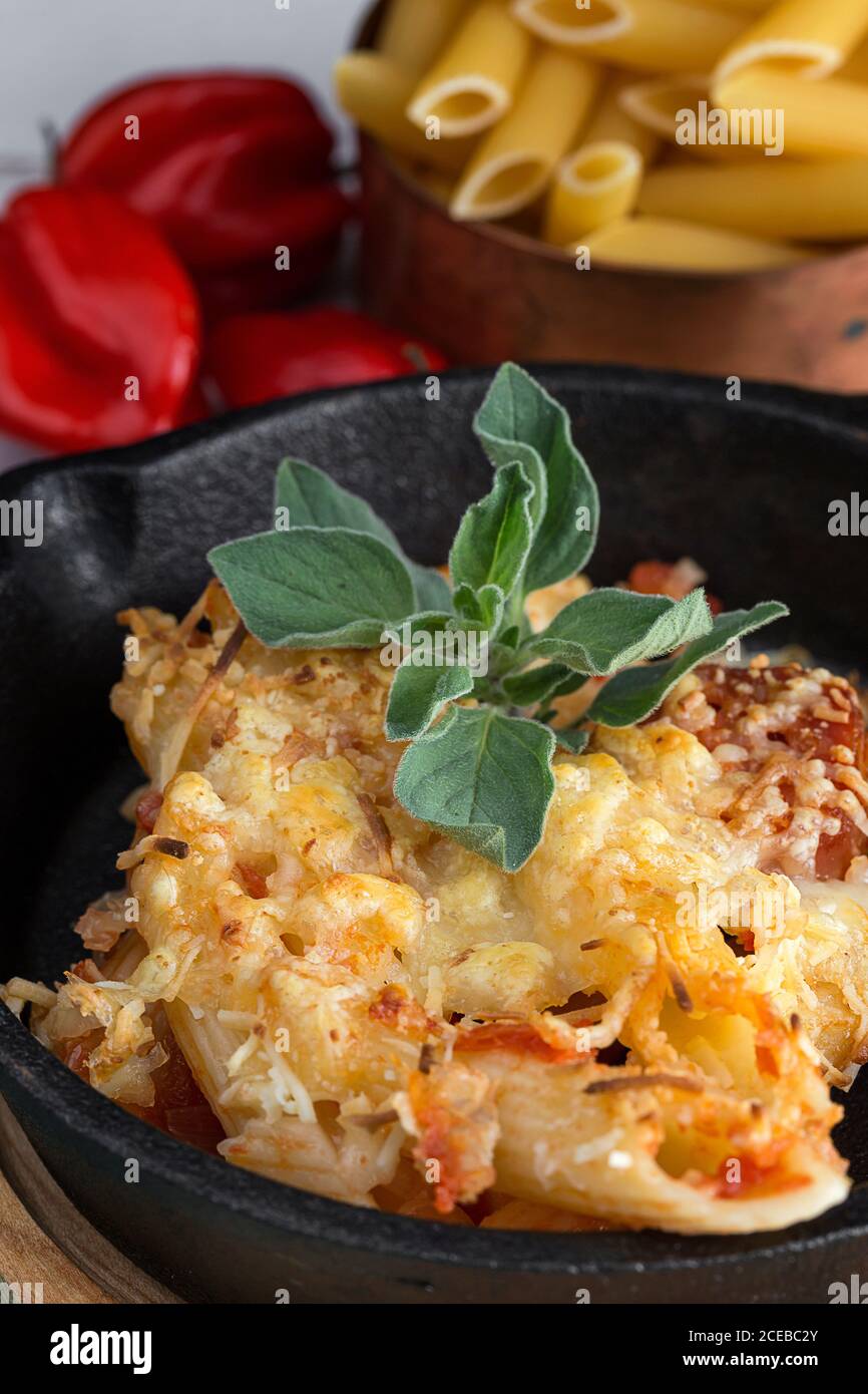 Macaroni with cheese and chorizo. Homemade. Italian pasta Stock Photo