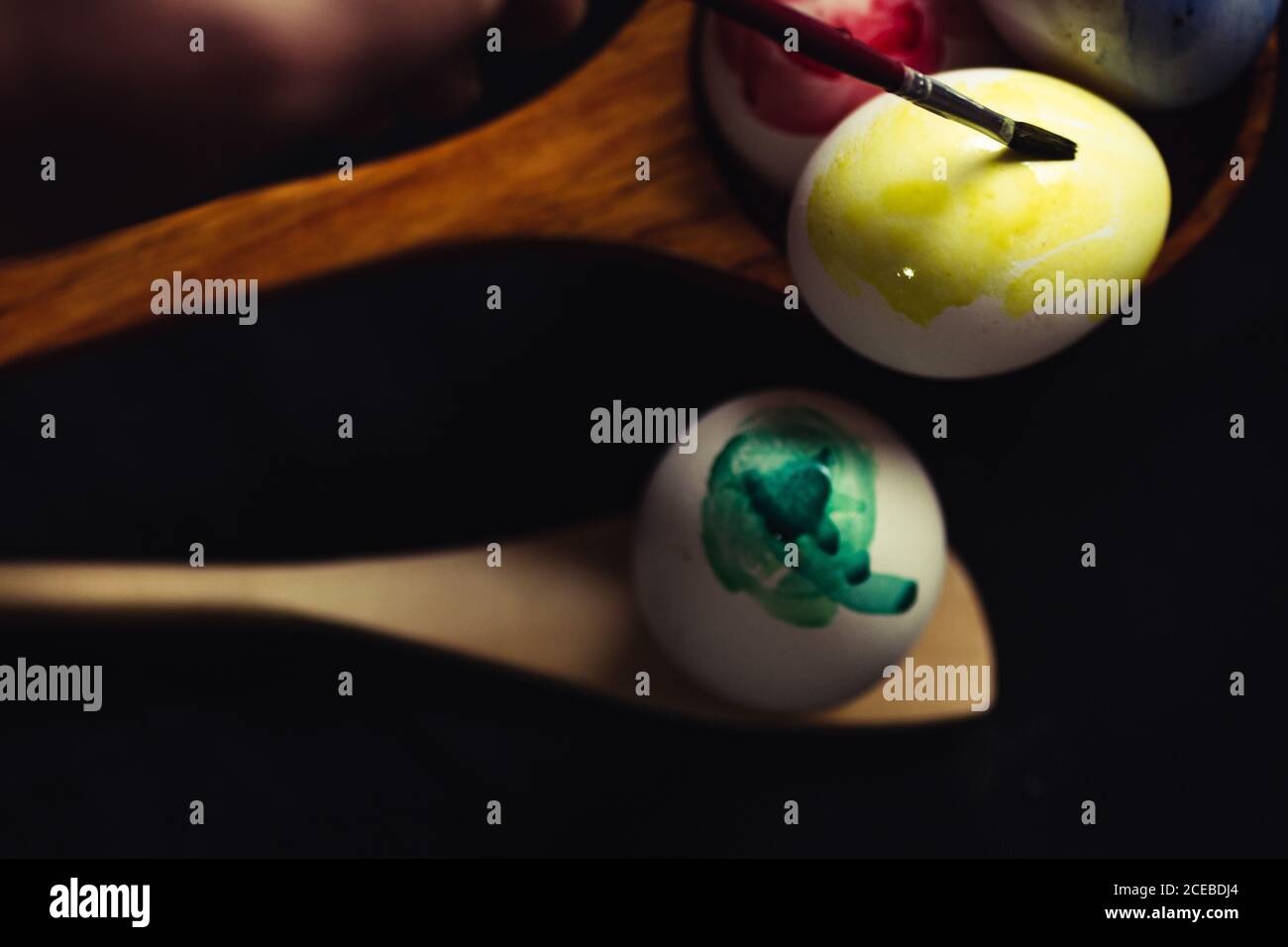Crop hand painting Easter egg Stock Photo
