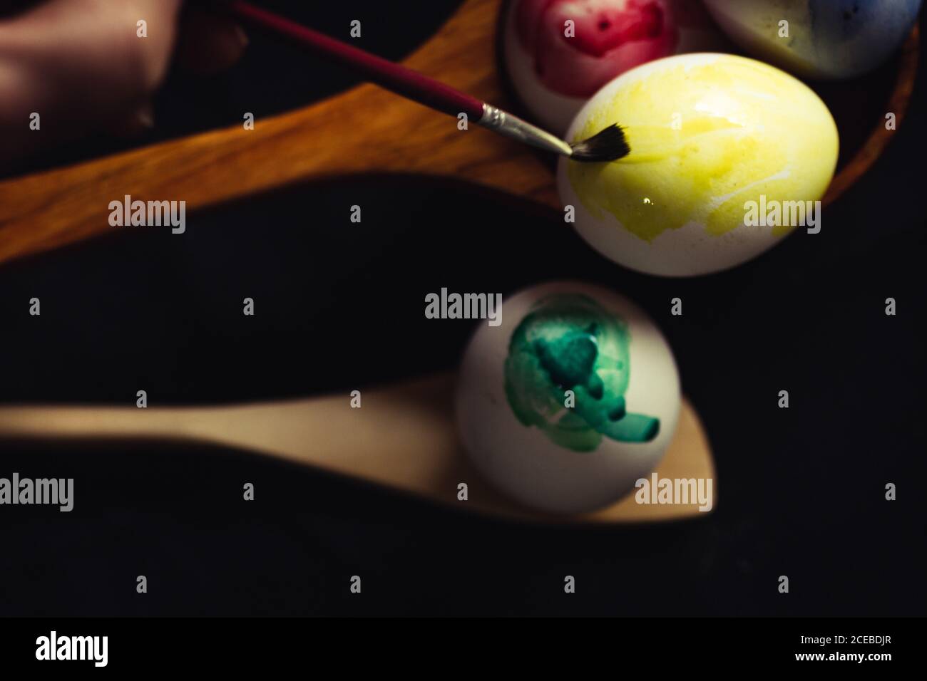 Crop hand painting Easter egg Stock Photo