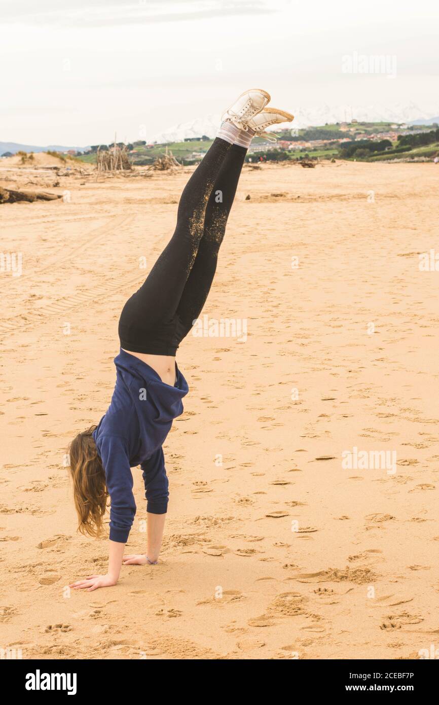 Girl doing handstand hi-res stock photography and images - Alamy