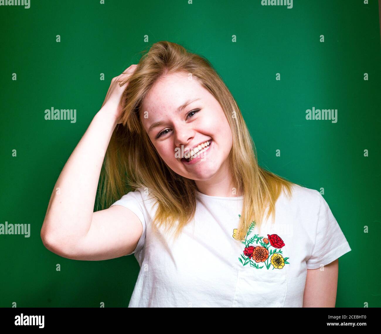 Blonde Woman posing in studio Stock Photo
