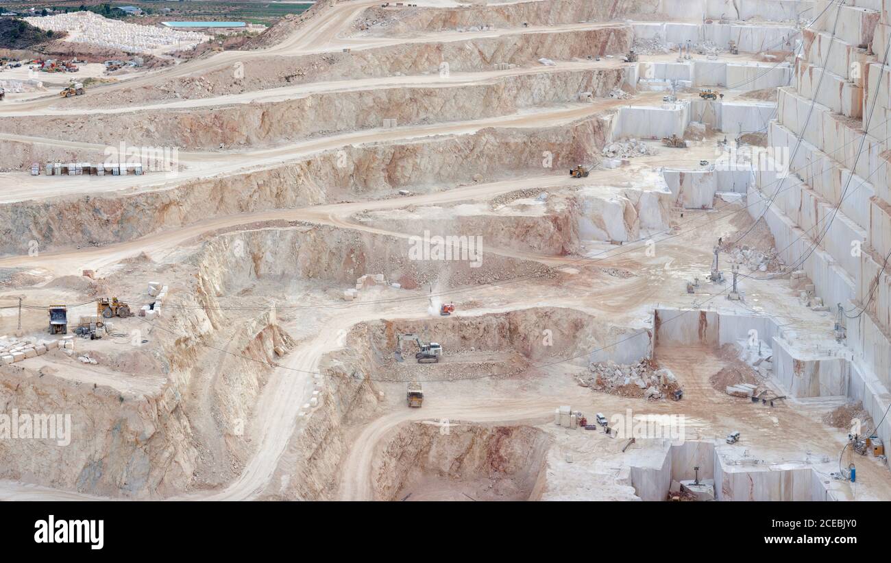 Steps in rough stone quarry Stock Photo - Alamy