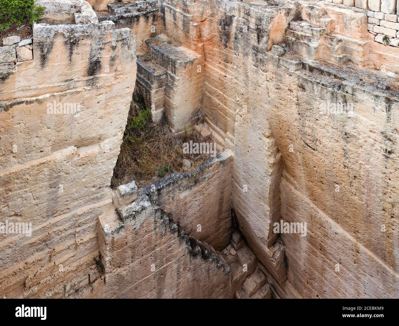 Steps in rough stone quarry Stock Photo - Alamy