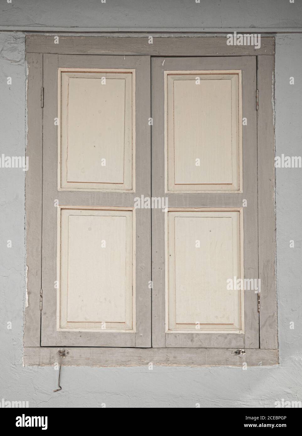 Old Grey and off white window Stock Photo