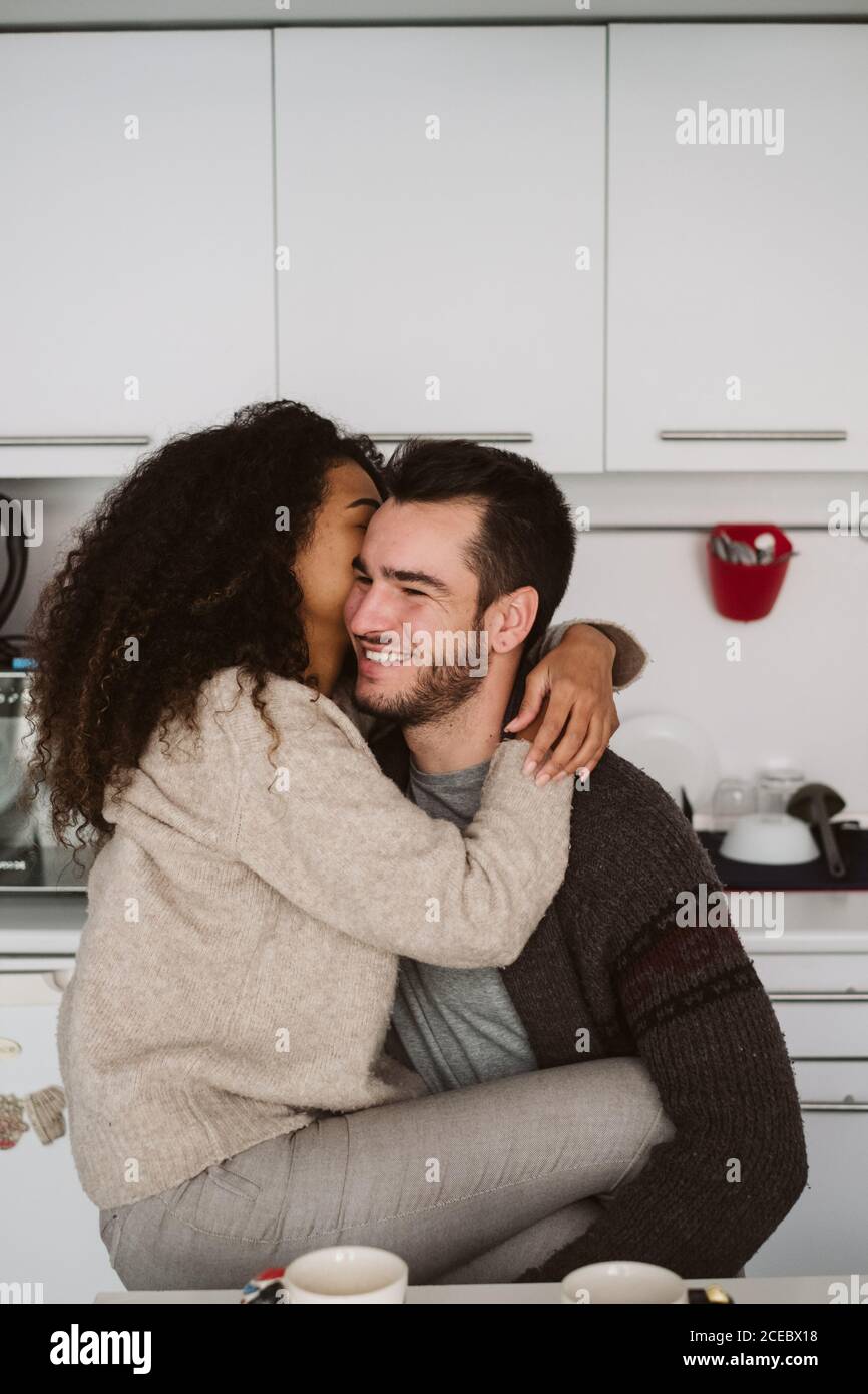 Multiethnic couple in modern kitchen Stock Photo