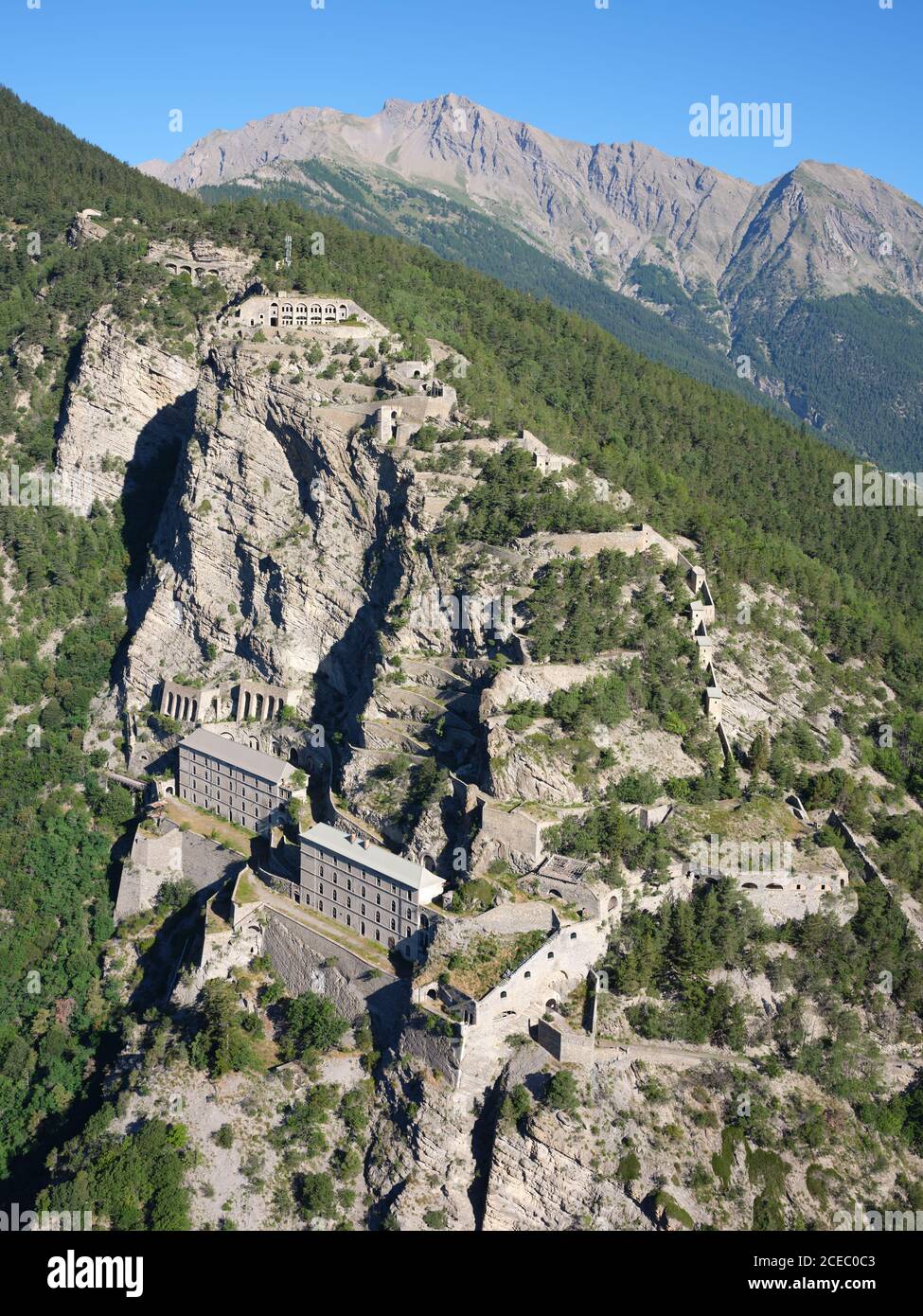 AERIAL VIEW. Fort de Tournoux, a military fortress above the Ubaye Valley, La Condamine-Châtelard, Alpes-de-Haute-Provence, France. Stock Photo
