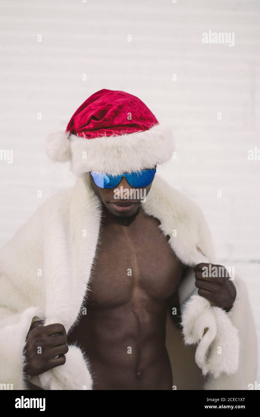 Handsome man in santa costume hi-res stock photography and images