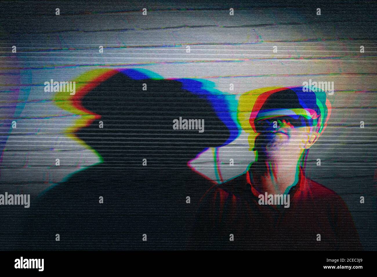 man testing VR glasses in the night Stock Photo