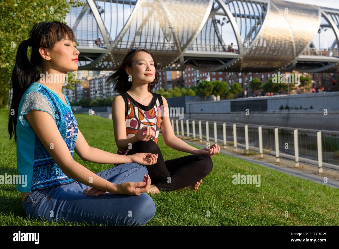 Two japanese women sitting hi-res stock photography and images - Alamy