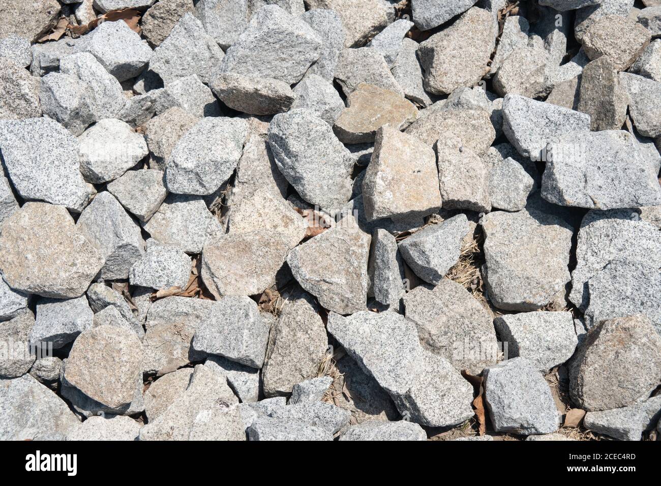 natural texture background granite stones sunny weather outdoor Stock Photo