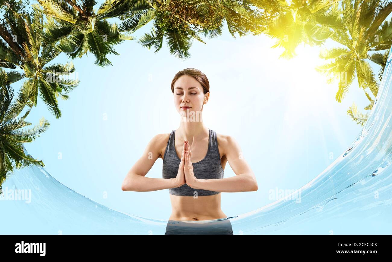 The girl is engaged in meditation Stock Photo