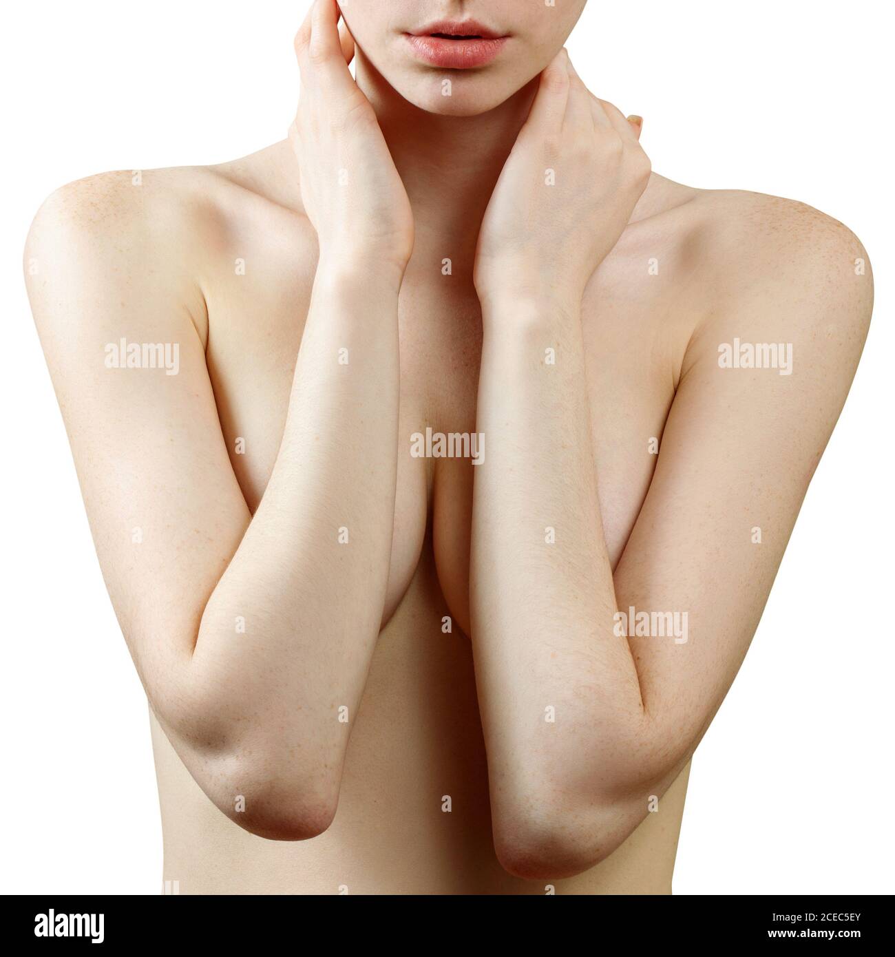 Beautiful naked women is covering her breasts. Stock Photo