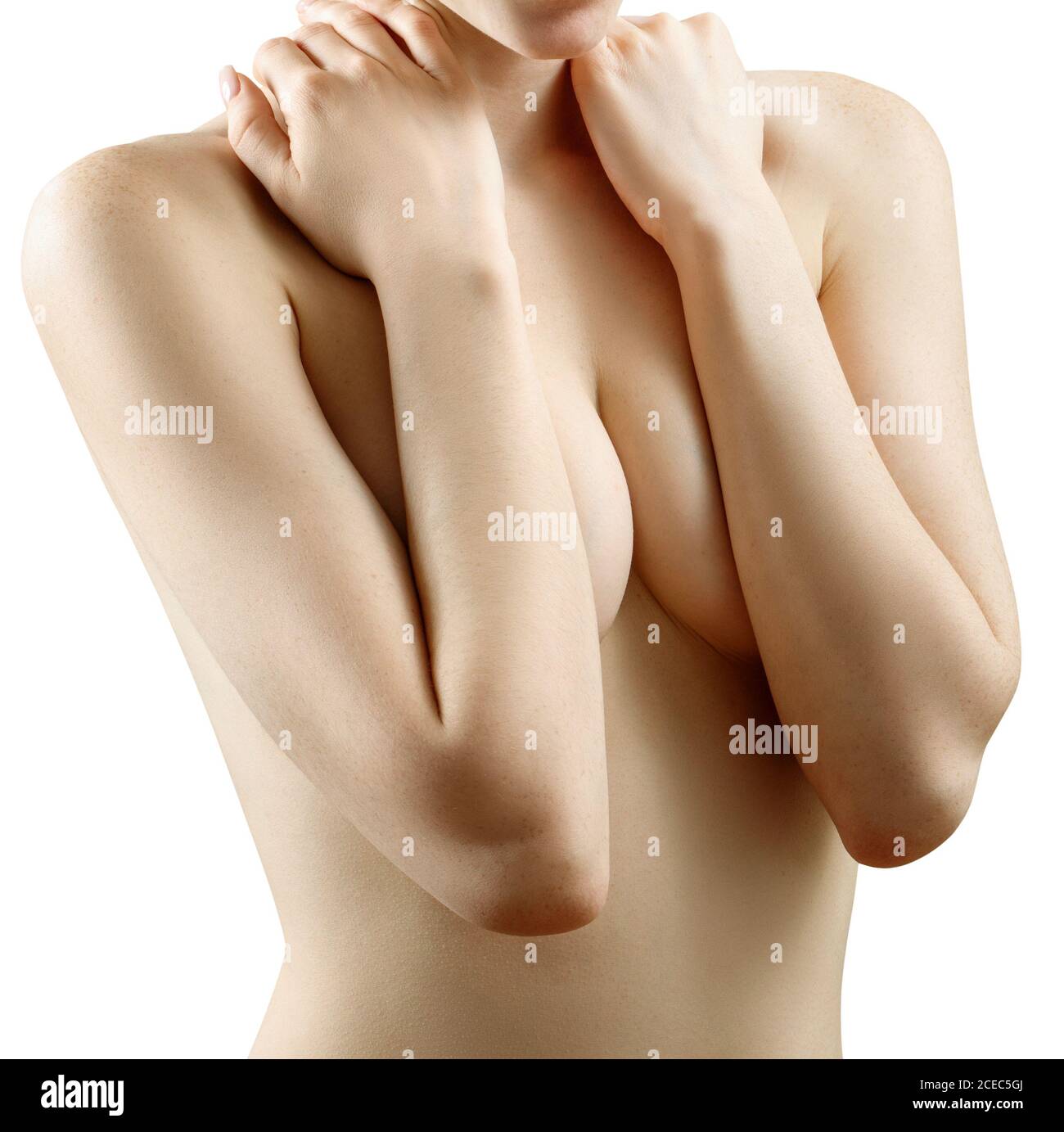 Beautiful naked women is covering her breasts. Stock Photo