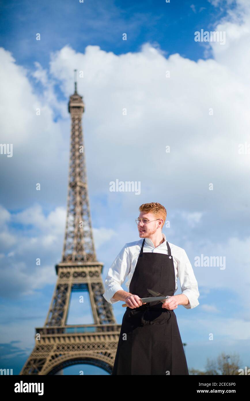 Red-Hair cook with uniform in Paris Stock Photo