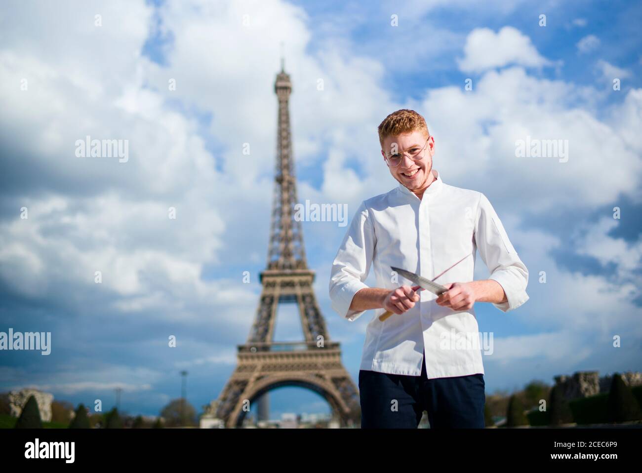 Red-Hair cook with knife in Paris Stock Photo