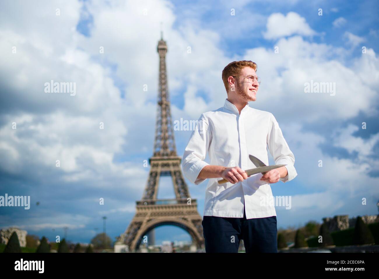 Red-Hair cook with knife in Paris Stock Photo