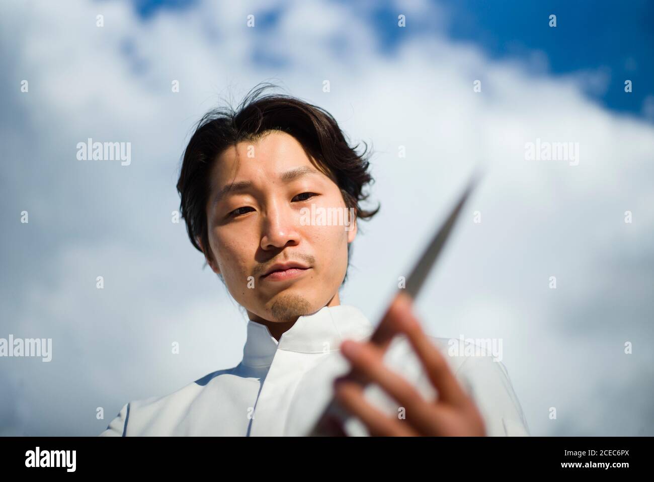 Japanese chef with knives in Paris Stock Photo