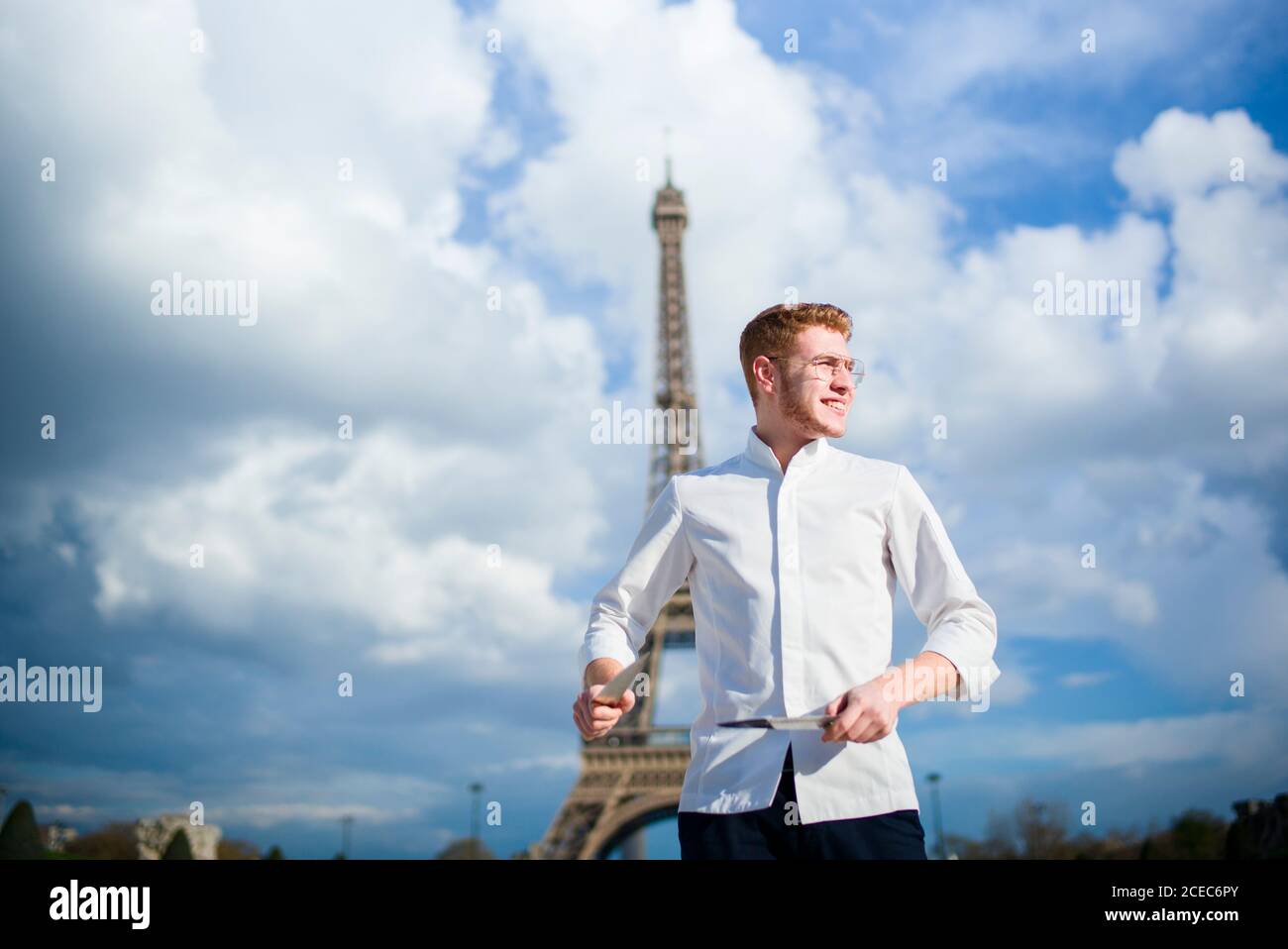 Red-Hair cook with knife in Paris Stock Photo