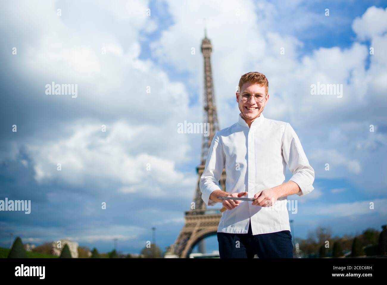 Red-Hair cook with knife in Paris Stock Photo