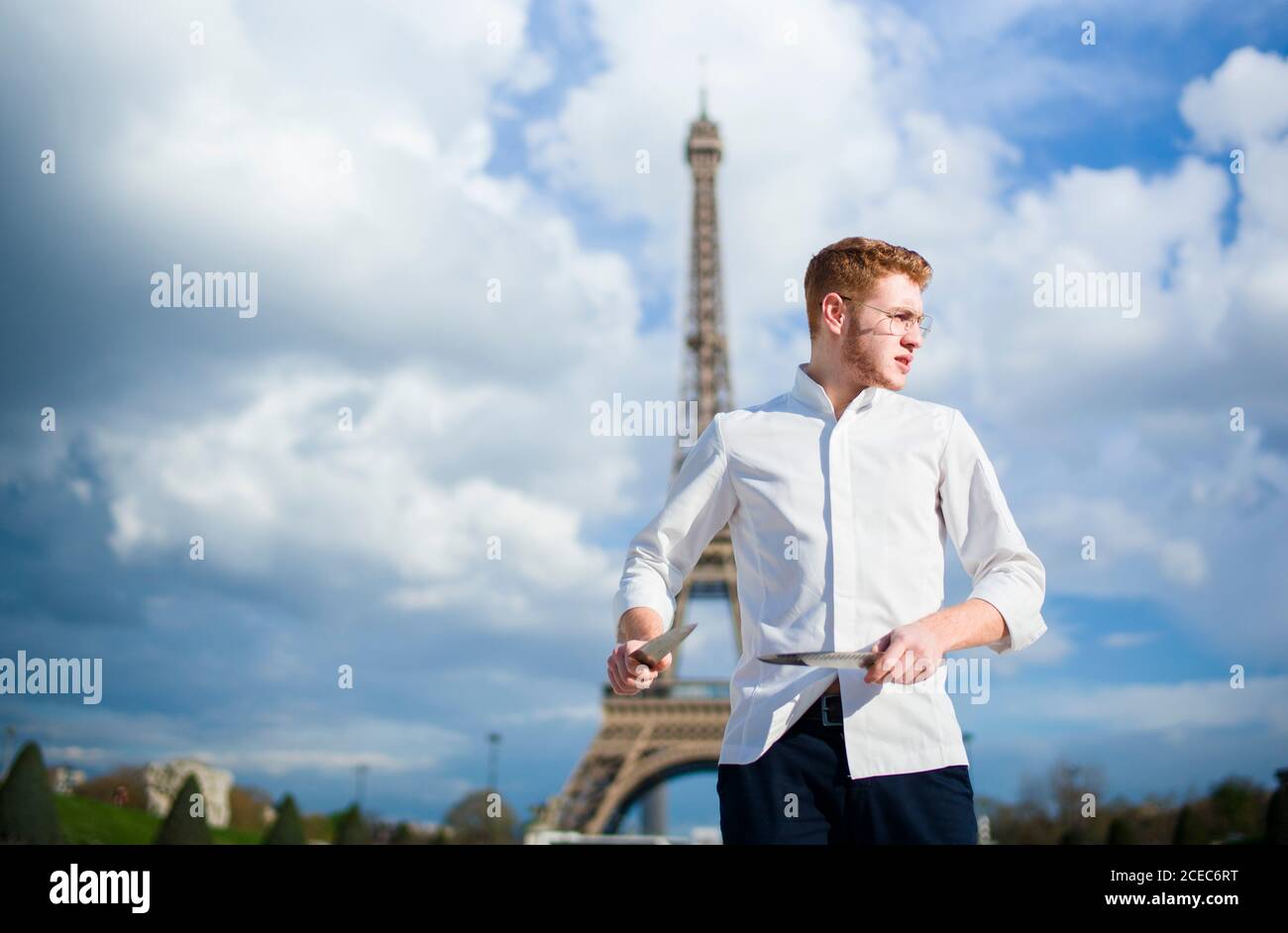 Red-Hair cook with knife in Paris Stock Photo