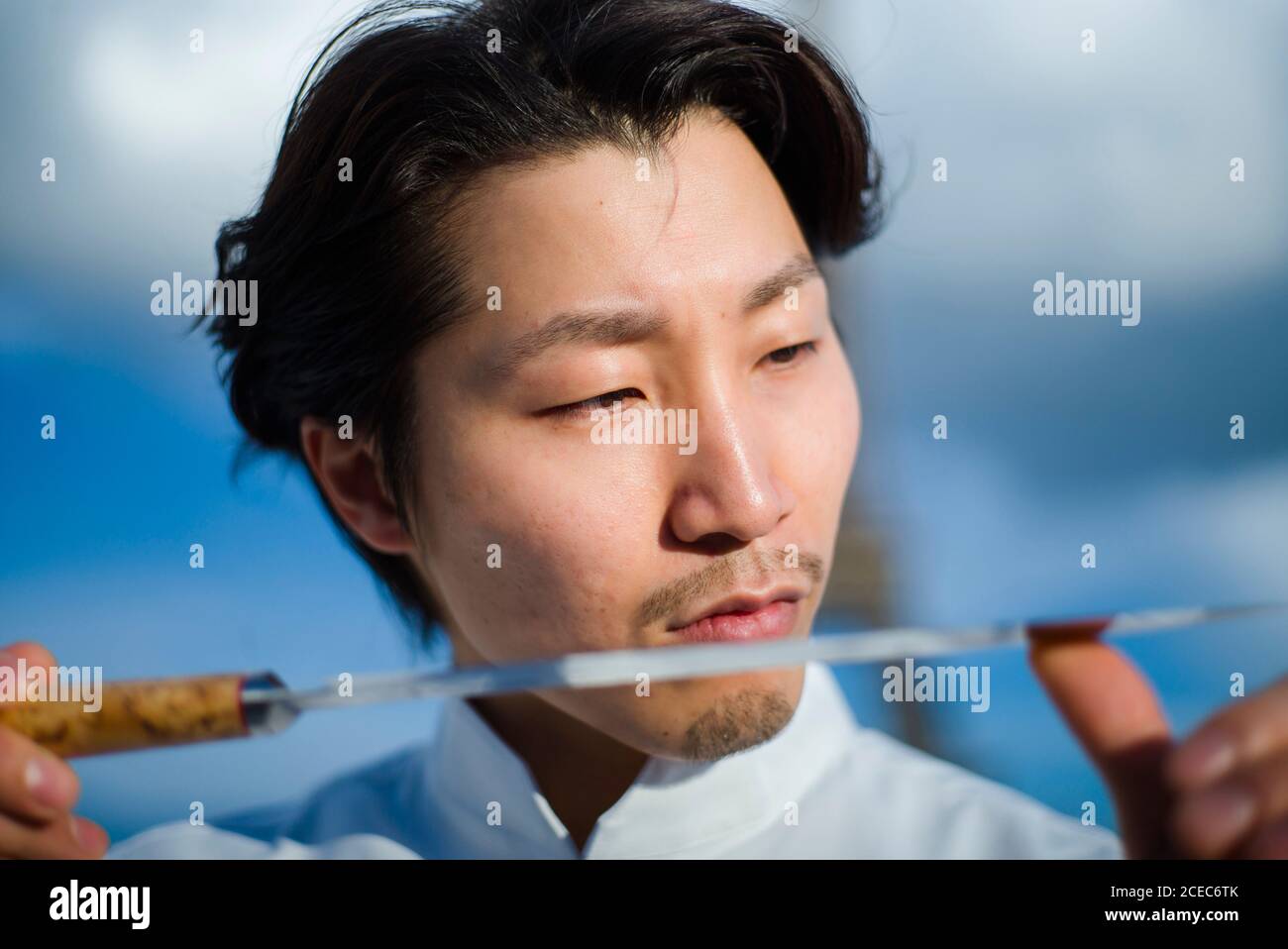 Japanese chef with knives in Paris Stock Photo