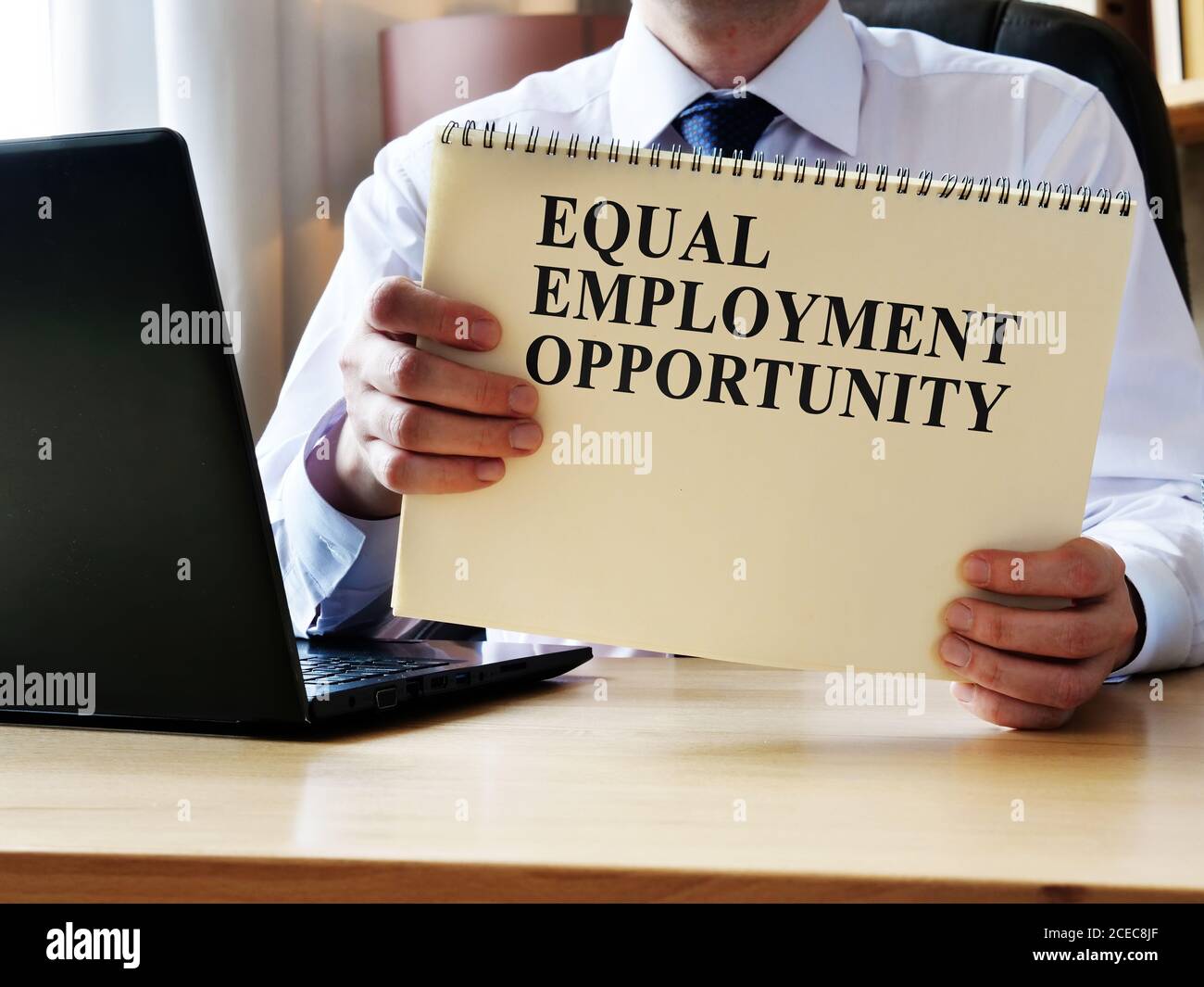 EEO equal employment opportunity. The manager shows the rules and guidelines. Stock Photo