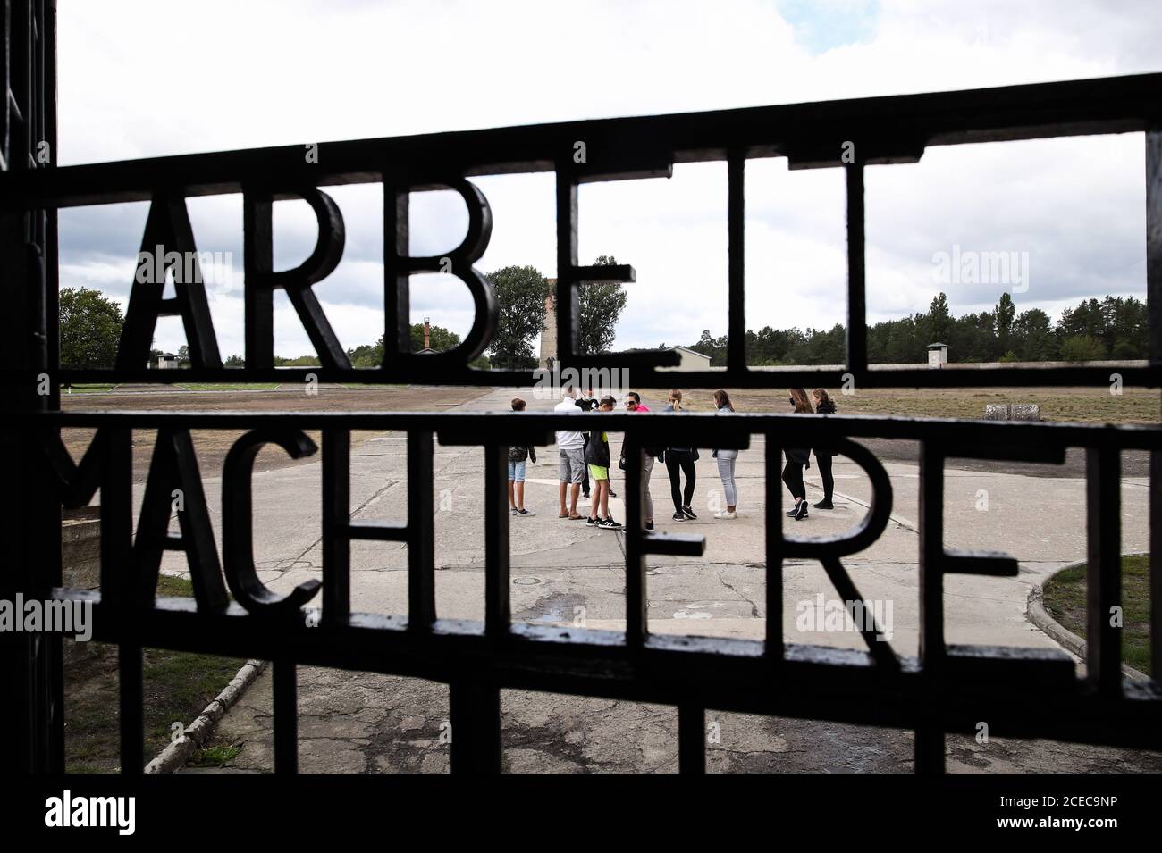 (200901) -- ORANIENBURG, Sept. 1, 2020 (Xinhua) -- Photo taken on Aug. 27, 2020 shows an entrance gate bearing the words 'Work makes (you) free' at the Sachsenhausen memorial in Oranienburg, Germany.  The Sachsenhausen concentration camp was built by the Nazis in Oranienburg in 1936. More than 200,000 people were interned at the facility between 1936 and 1945, and about 100,000 died there. As a memorial and museum today, the Sachsenhausen memorial attracts about 700,000 visitors every year to witness the crimes of the Nazis. (Xinhua/Shan Yuqi) Stock Photo