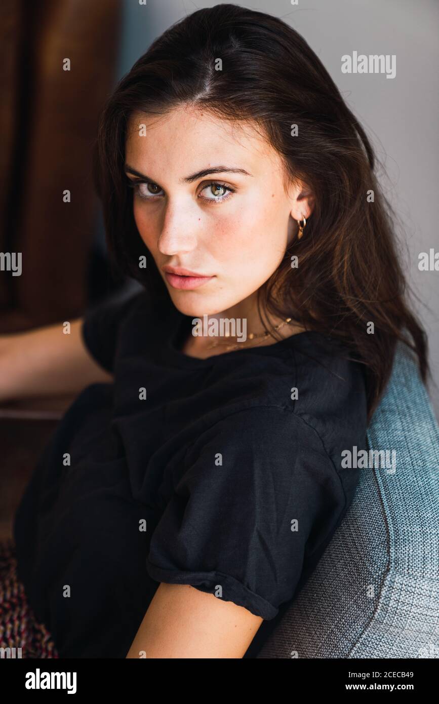 Woman sitting on chair from above hi-res stock photography and images ...