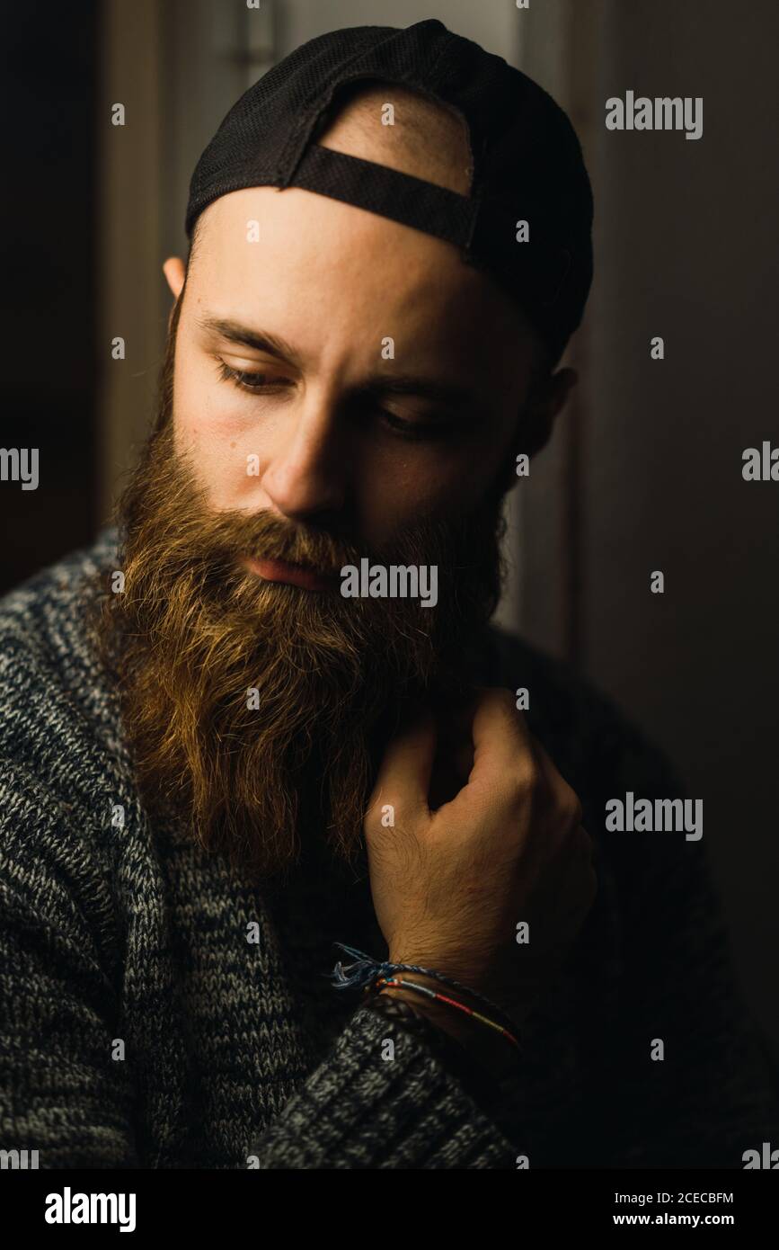 Portrait bearded young man cap hi-res stock photography and images - Alamy
