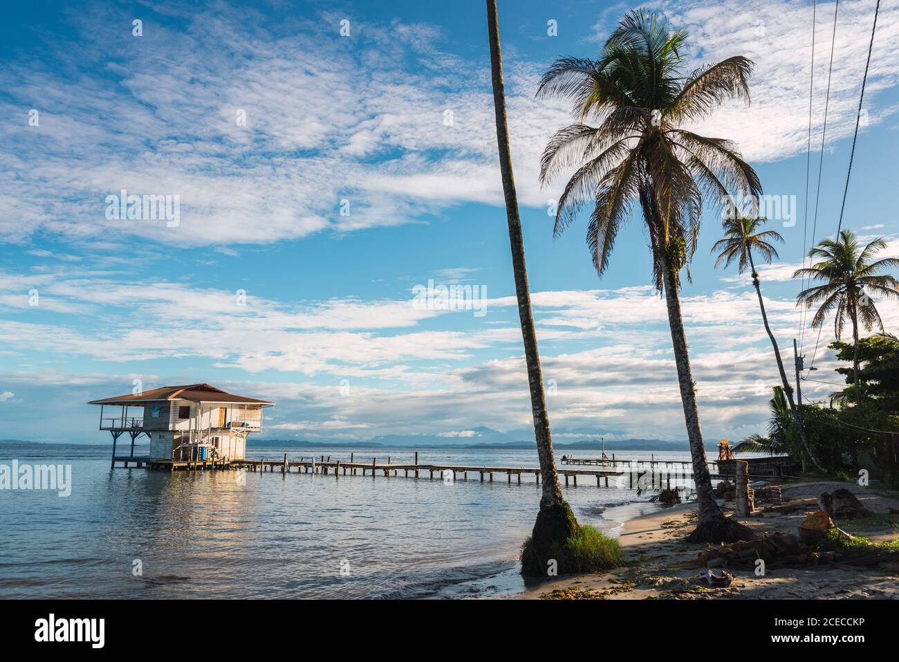 Beautiful landscape of perspective wooden pier with small house in ...