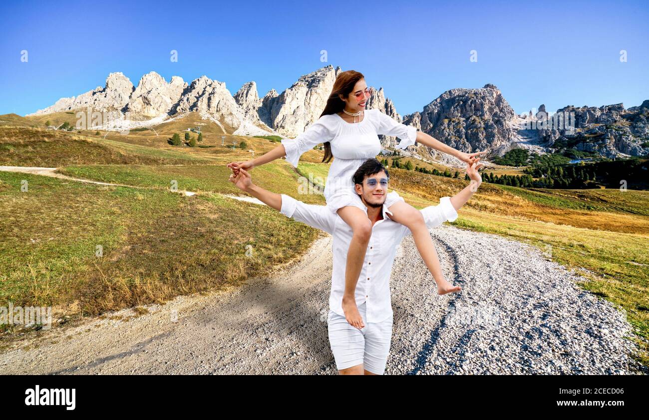 Man carrying young woman on his shoulders hi-res stock photography and ...