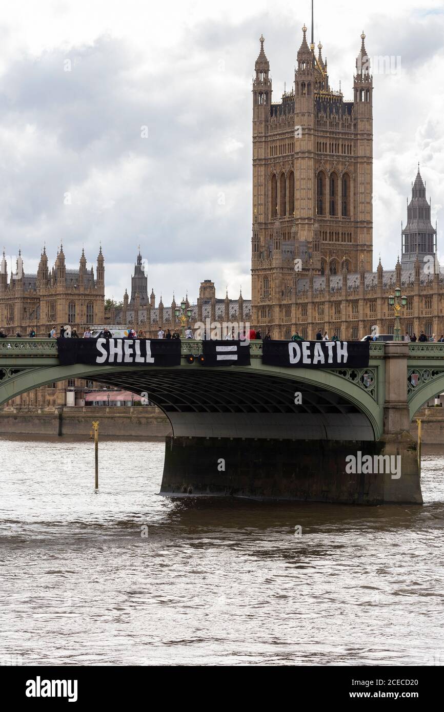 Banner drop on Westminster Bridge during an Extinction Rebellion demonstration London, 28 August 2020 Stock Photo