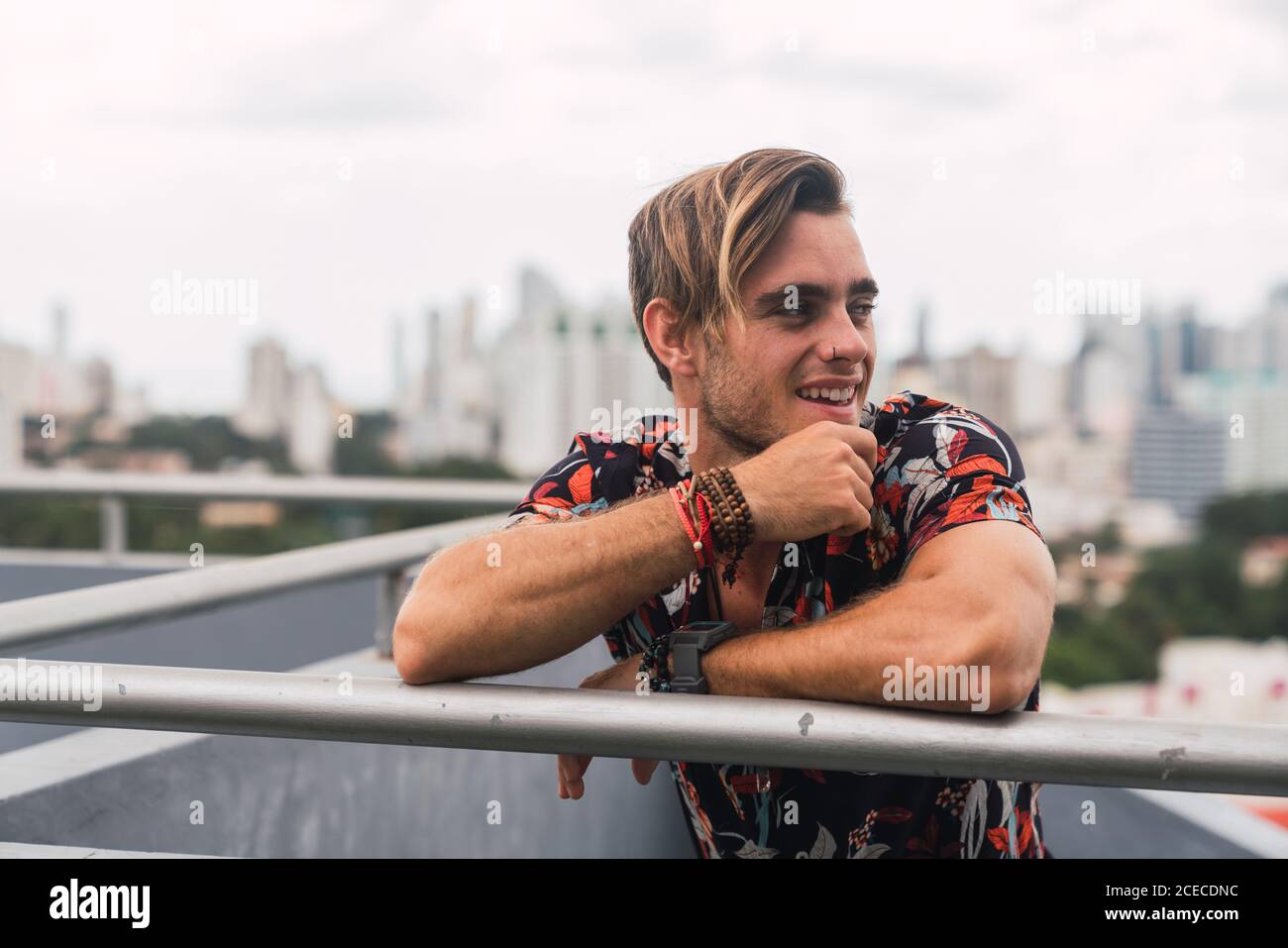 Leaning on bar hi-res stock photography and images - Alamy