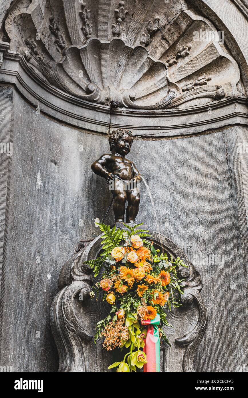 Brussels, Belgium - January 22, 2018  Manneken Pis (Little man Pee) or le Petit Julien is a small, bronze sculpture that represents a naked little boy Stock Photo