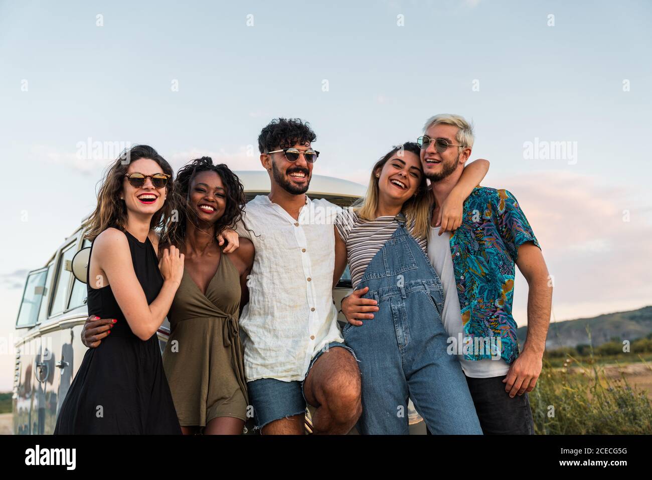 friends hugging in nature Stock Photo